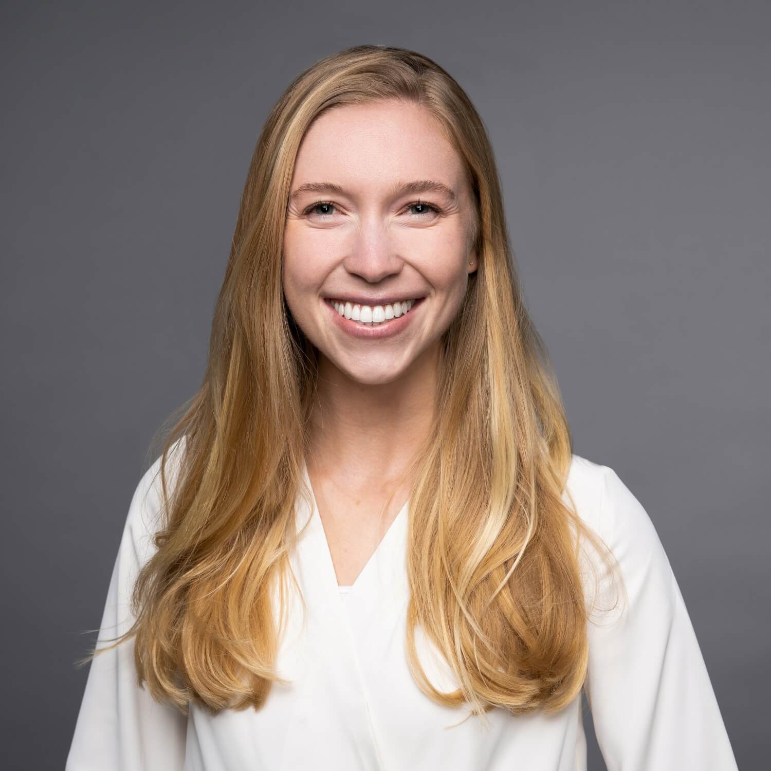 corporate headshot photography example on grey background