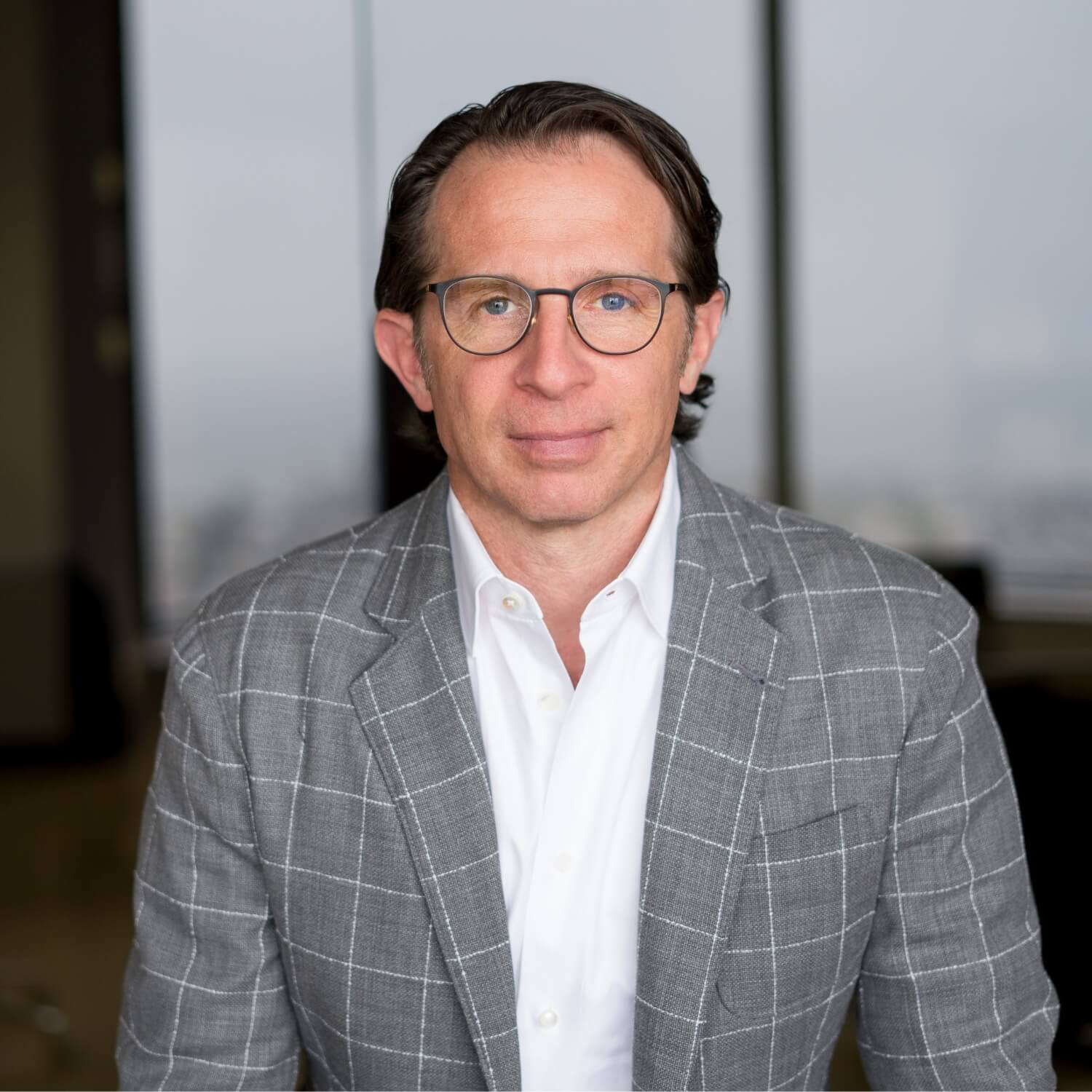 Executive headshot photography at a corporate office